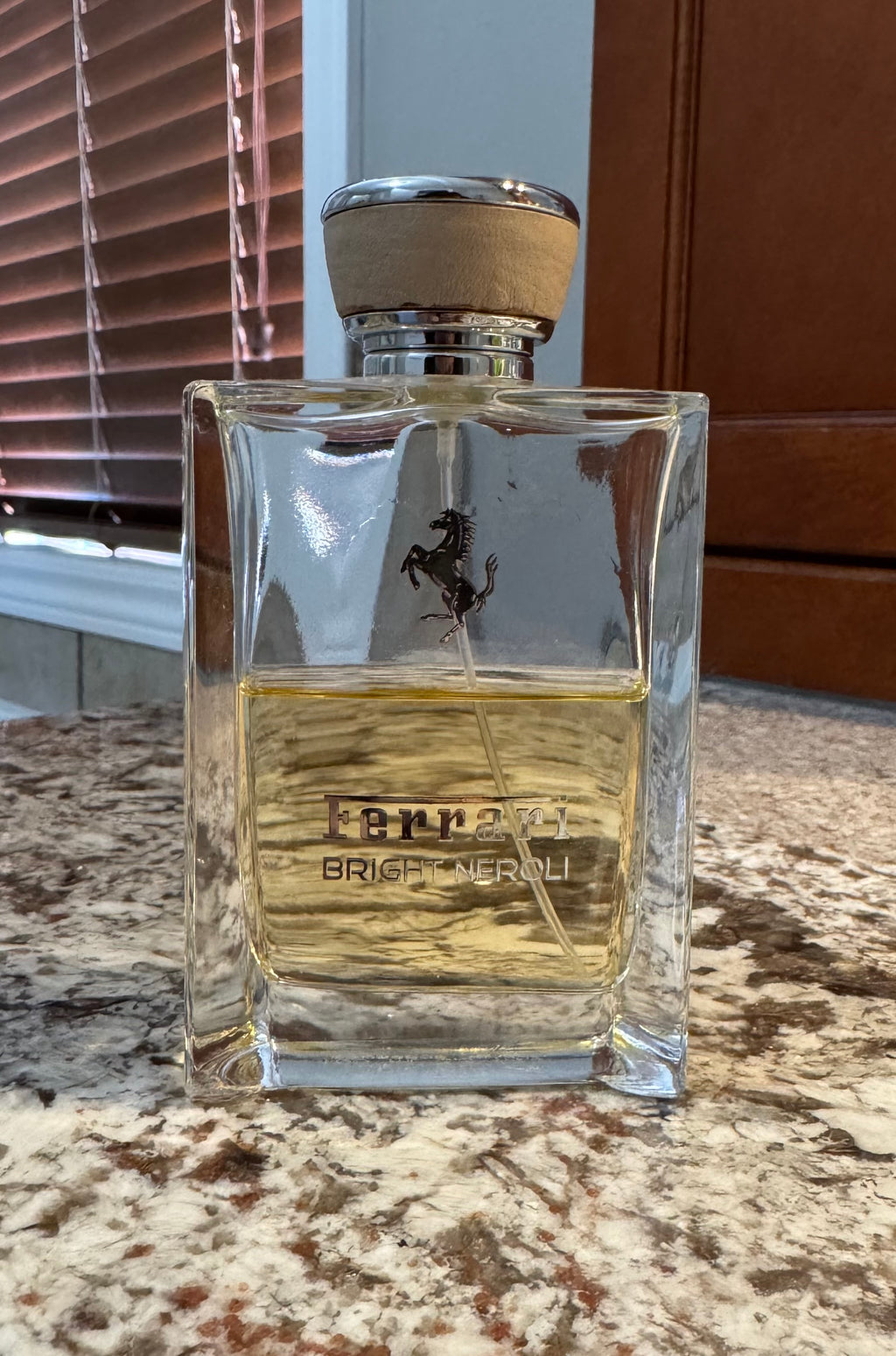 Ferrari Bright Neroli authentic fragrance, hand-decanted into a travel bottle