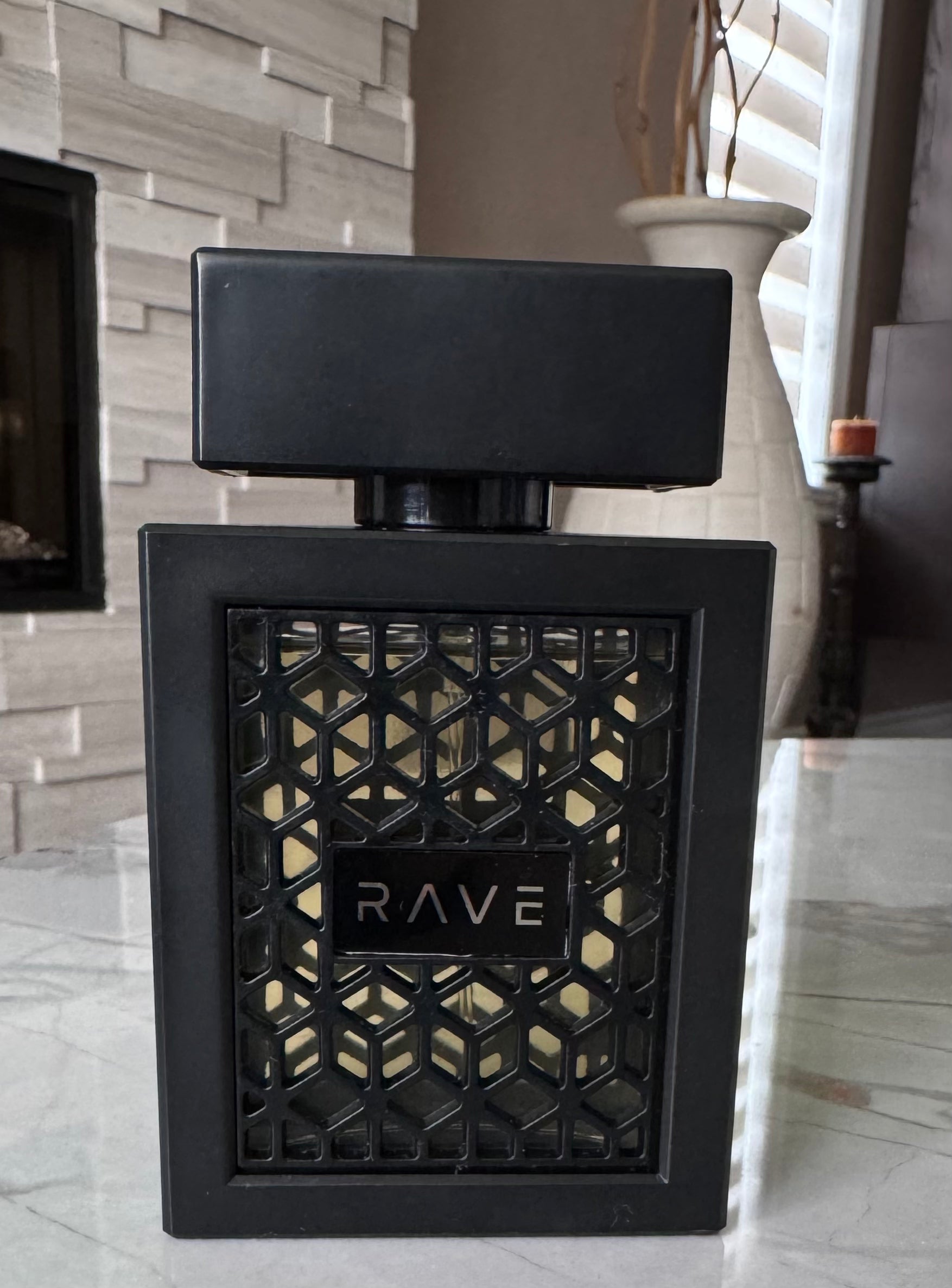 Lattafa Rave Now Black Edition authentic fragrance, hand-decanted into a travel bottle