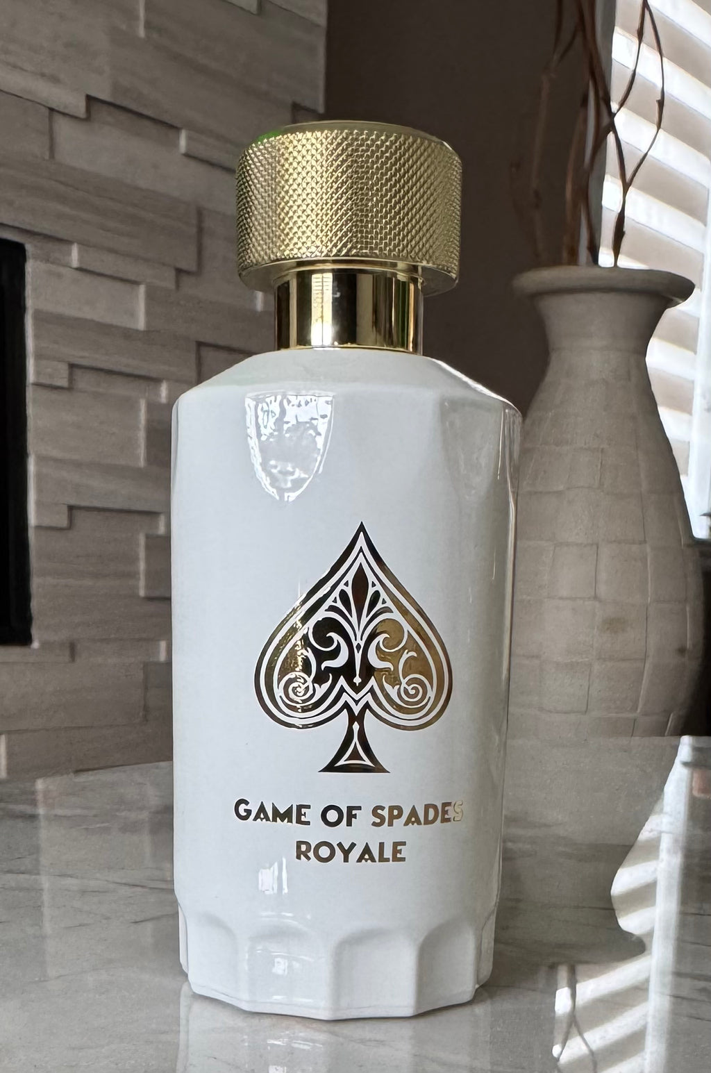 Game of Spades Royale authentic fragrance, hand-decanted into a travel bottle