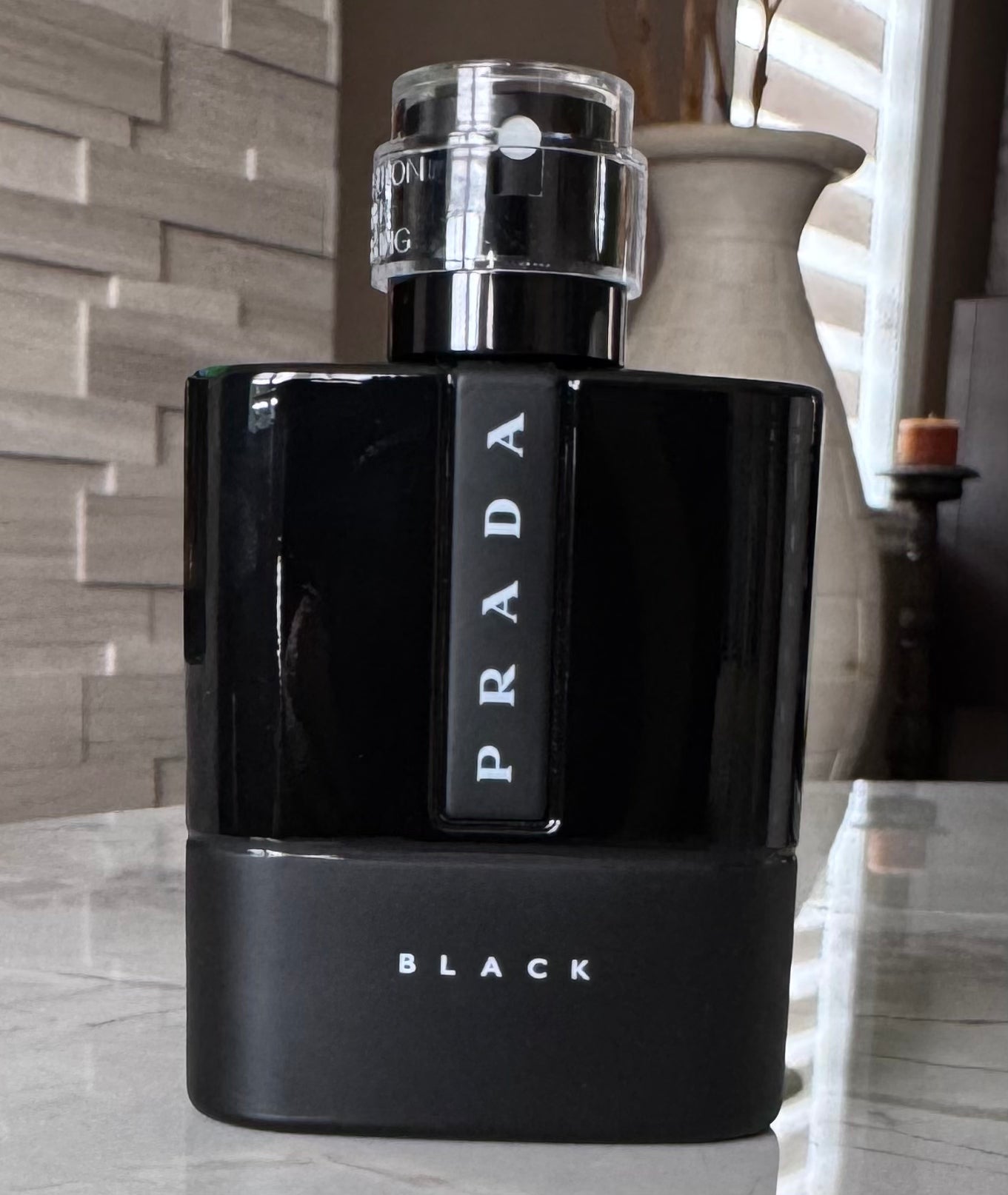 Prada Luna Rossa Black authentic fragrance, hand-decanted into a travel bottle