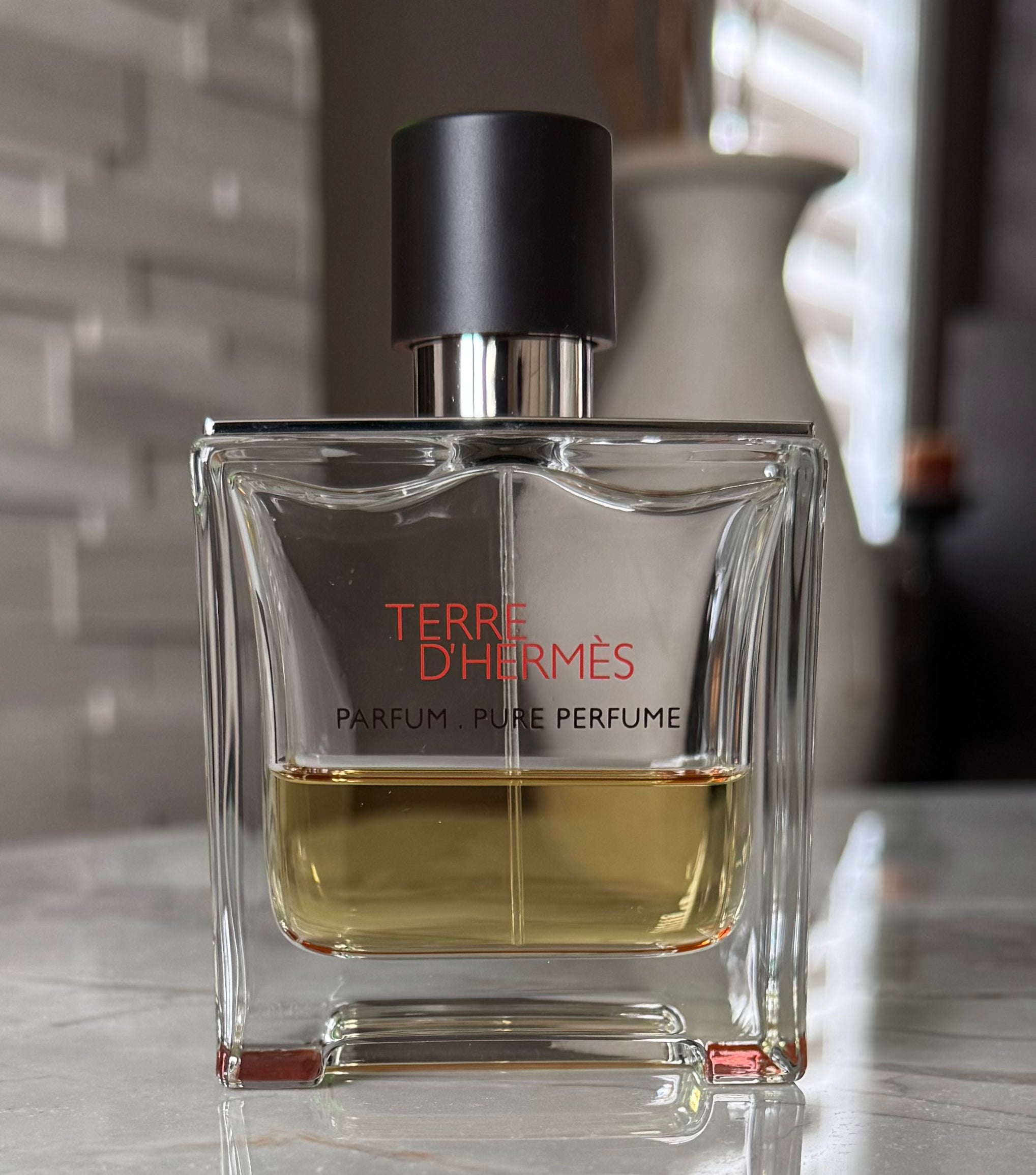 Terre d’Hermès Parfum authentic fragrance, hand-decanted into a travel bottle