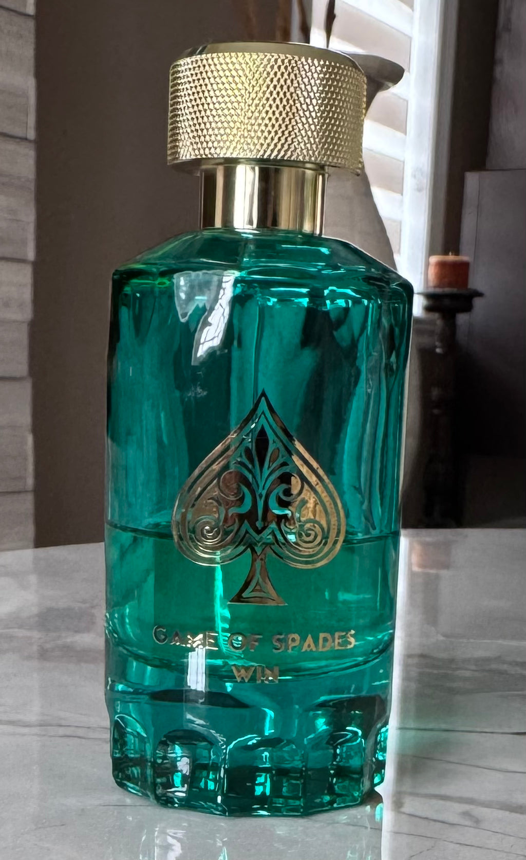 Game of Spades Win authentic fragrance, hand-decanted into a travel bottle
