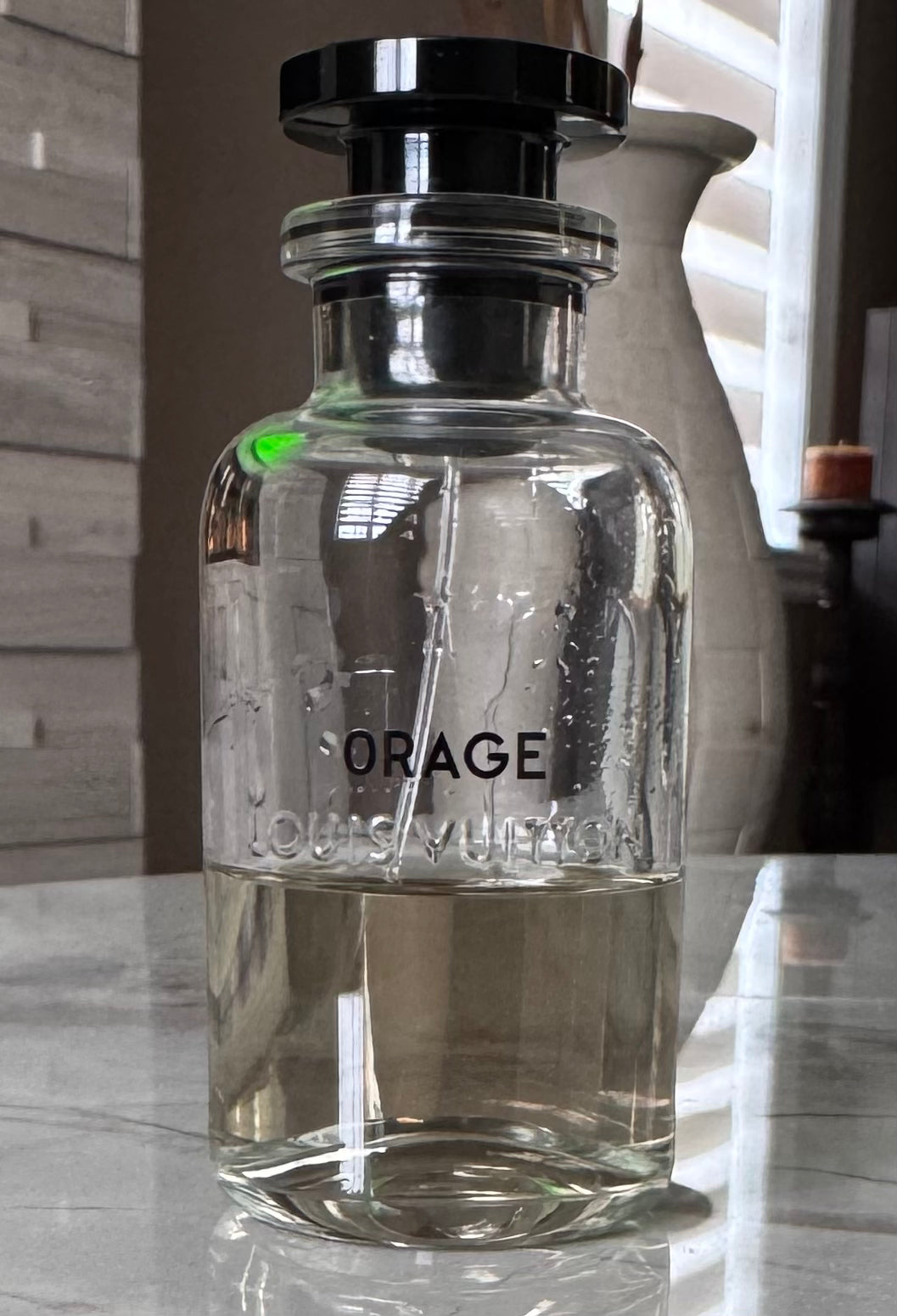 Louis Vuitton Orage authentic fragrance, hand-decanted into a travel bottle