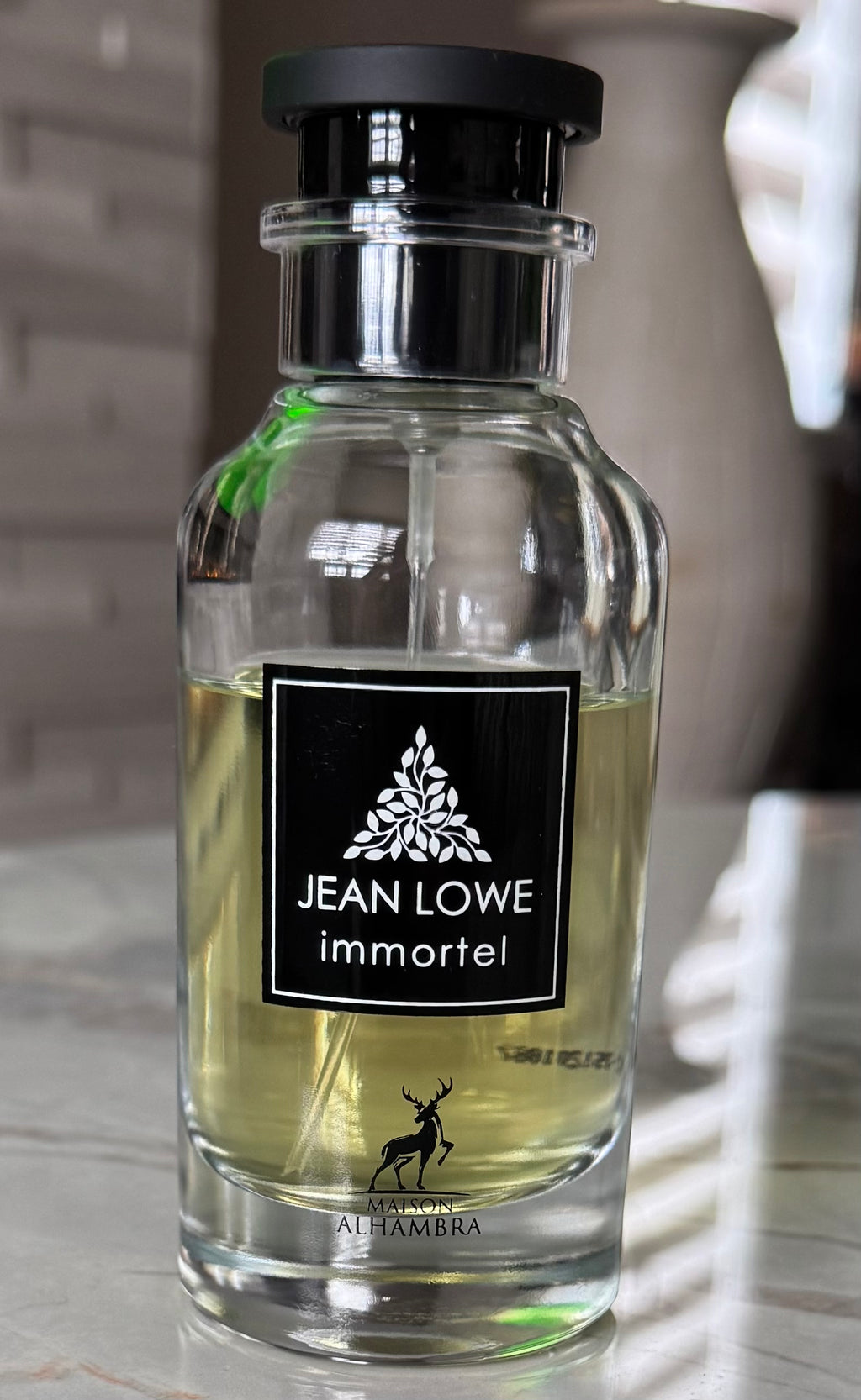 Maison Alhambra Jean Lowe Immortal authentic fragrance, hand-decanted into a travel bottle