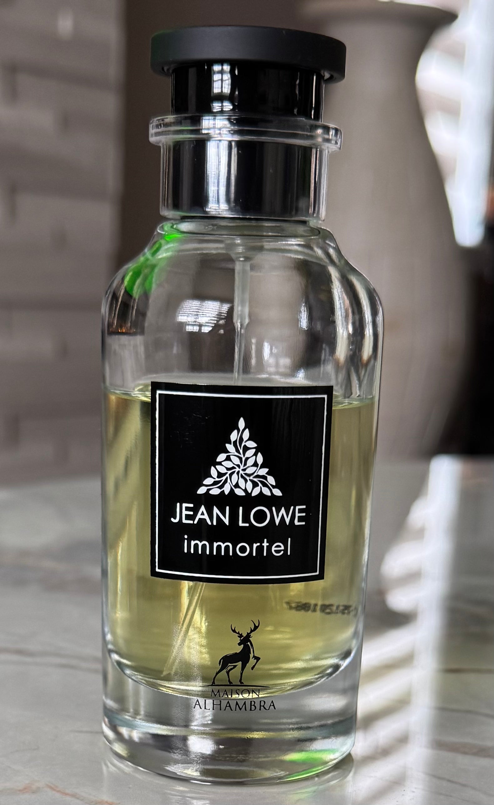 Maison Alhambra Jean Lowe Immortal authentic fragrance, hand-decanted into a travel bottle