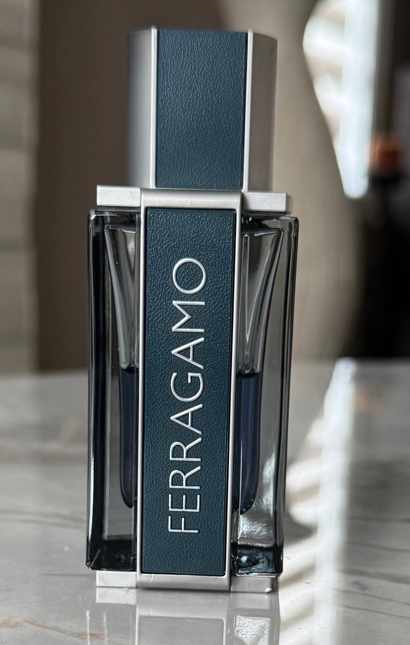 Salvatore Ferragamo Intense Leather authentic fragrance, hand-decanted into a travel bottle