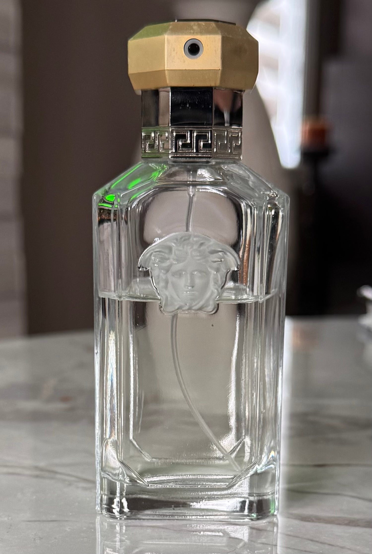 Versace The Dreamer authentic fragrance, hand-decanted into a travel bottle