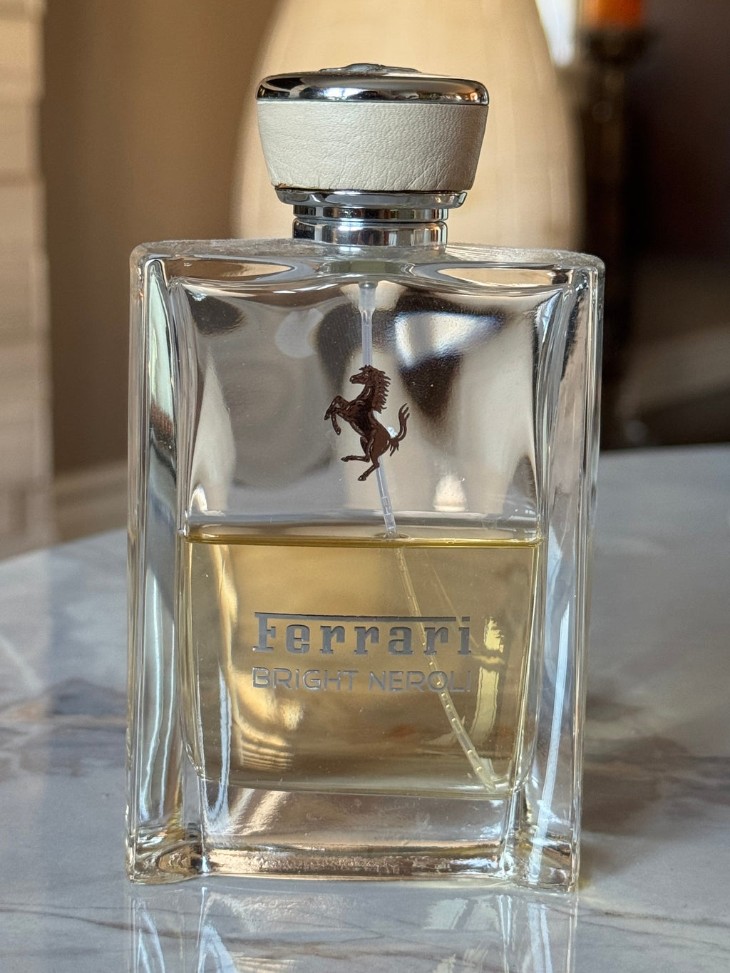 Ferrari Bright Neroli full bottle, authentic fragrance decanted by Maison Sillage Co.