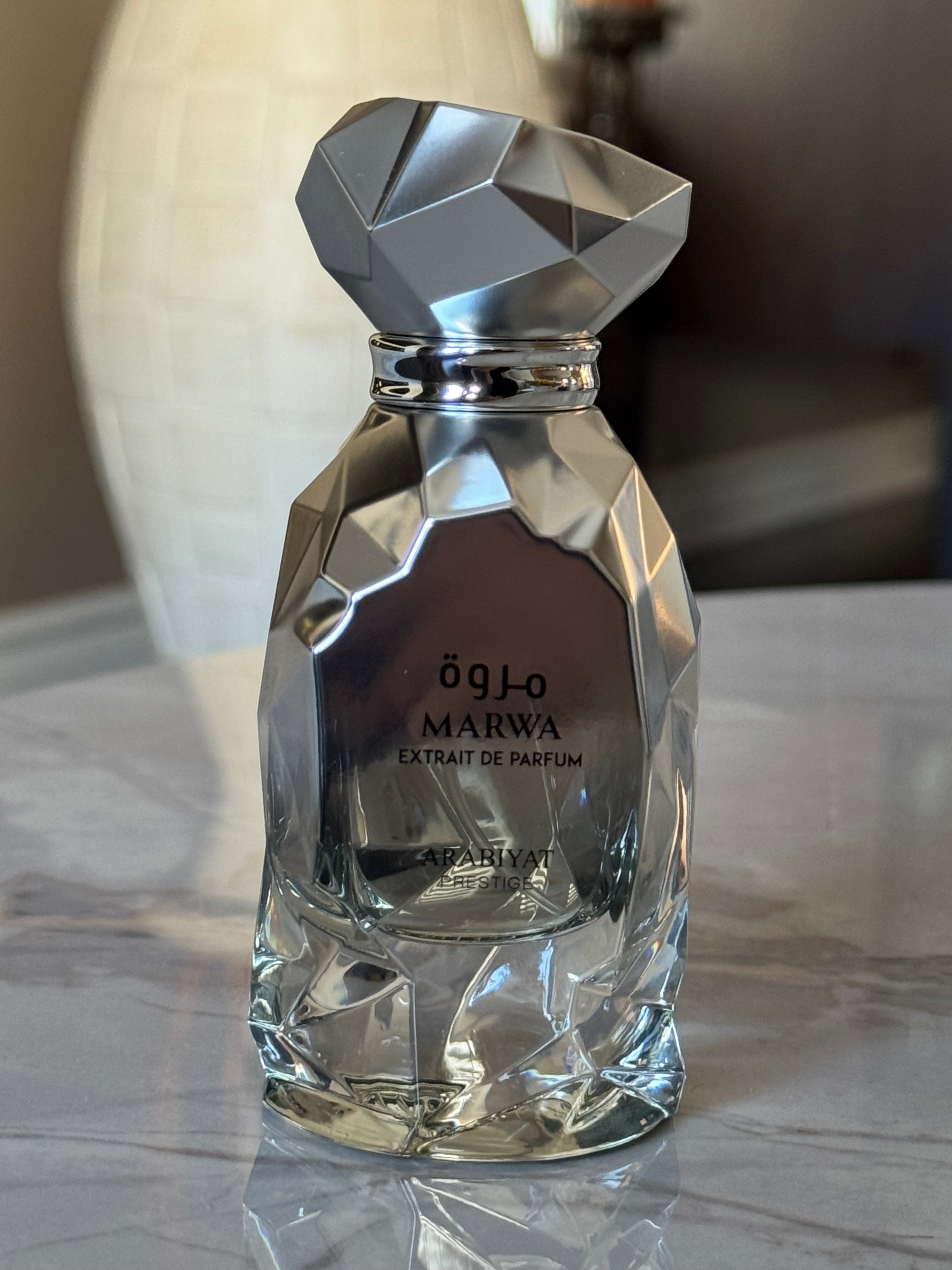 Arabiyat Prestige Marwa Extrait 60ml bottle, hand-decanted into 2ml and 10ml travel sizes